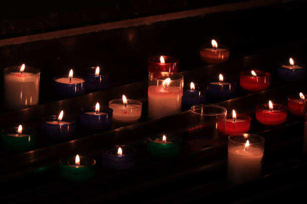 istock Votive candles in a church 1196575293