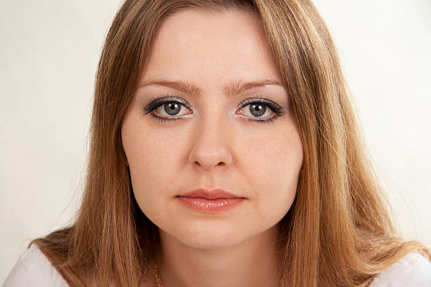 istock Beautiful woman sad. White background 119658146