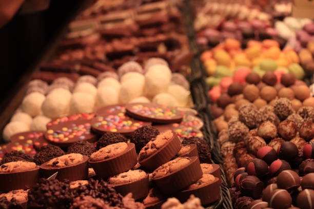 Chocolate pralines in different colors and shapes at a market in Barcelona, Spain