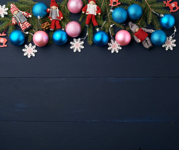 istock green spruce branches, Christmas blue and pink balls 1196589607