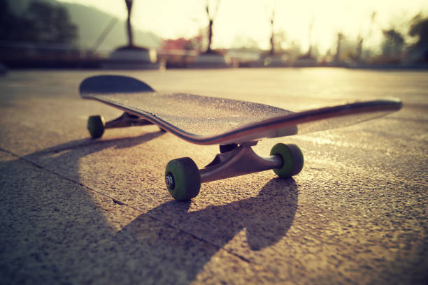 istock Skateboard ready for riding at sunrise city 1196589654