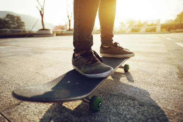 istock Skateboard ready for riding at sunrise city 1196590383