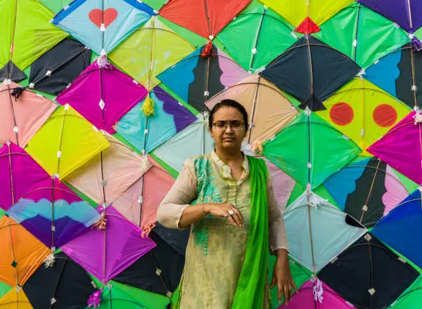 Photo of woman with Patang(kite) for Makar Sankranti festival of India