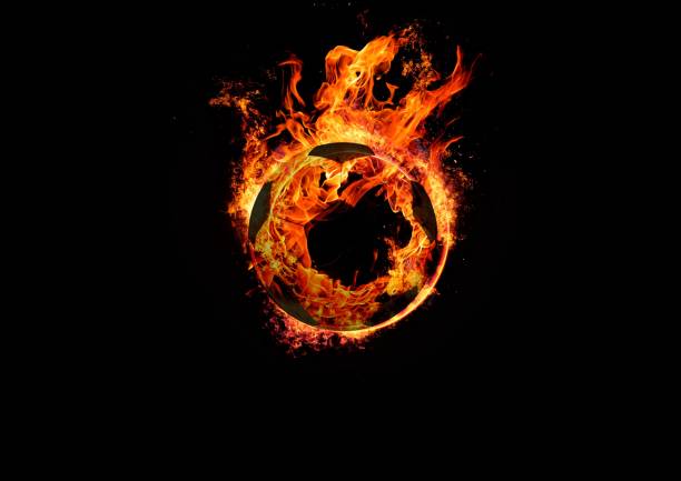 istock Abstract soccer ball wrapped in flame 1196593509