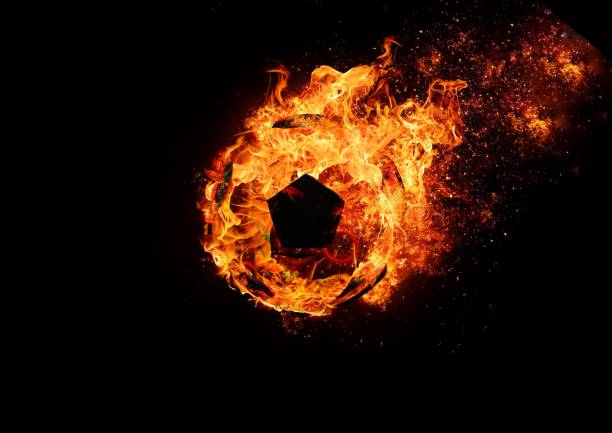 Abstract soccer ball wrapped in flame