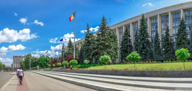 Government House in Chisinau, Moldova Chisinau, Moldova "u2013 06.28.2019. Government House in the center of Chisinau, capital of Moldova, on a sunny summer day chisinau photos stock pictures, royalty-free photos & images