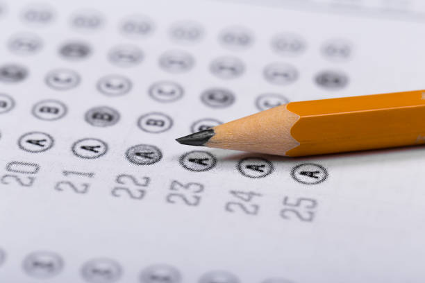istock Fill in the answer sheet in the exam with a pencil 1196596958