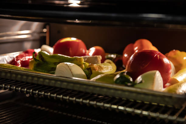 istock Vegetables Roasting in Oven - Close up good lighting 1196606718