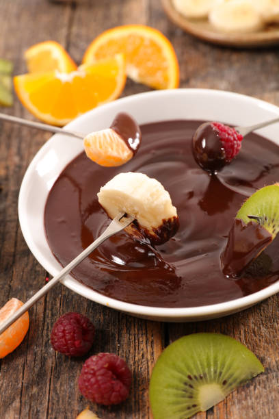 istock chocolate sauce and fruits dipping 1196608454