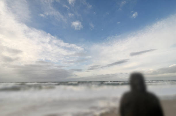istock Man by the Sea 1196614322