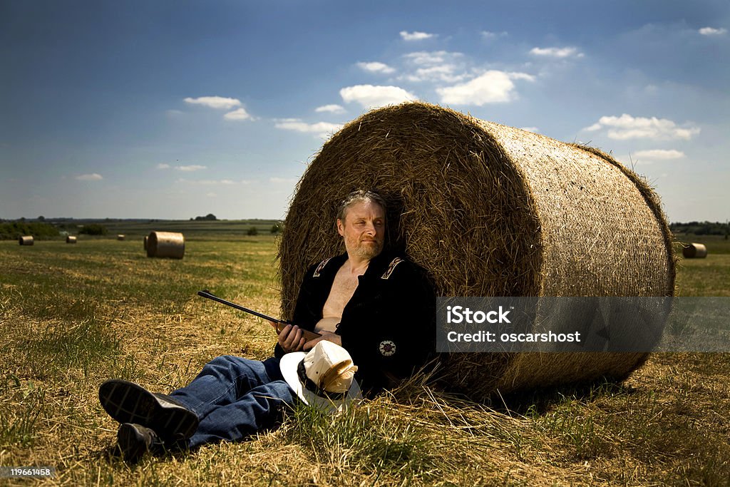 Resting farmer in field  Farmer Stock Photo
