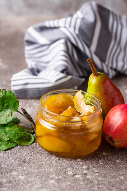 istock Apple jam in glass jar 1196617863
