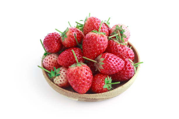 istock fresh strawberries on white background 1196618118