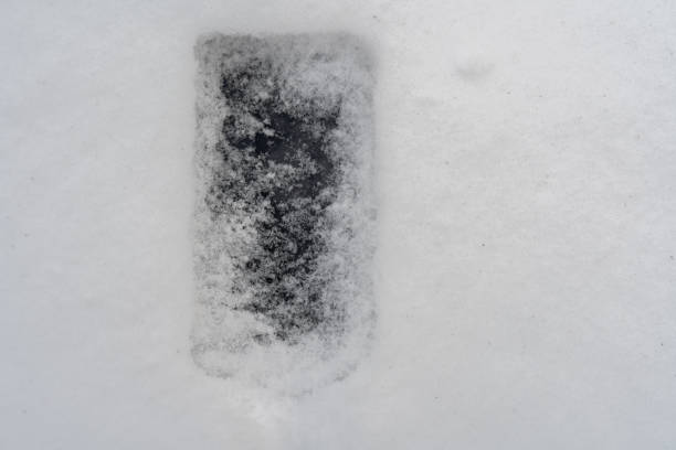 istock frozen smart phone in snow 1196618832