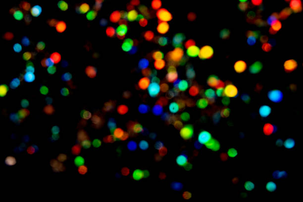 istock Beautiful and festive blurred lights on black background. 1196619057