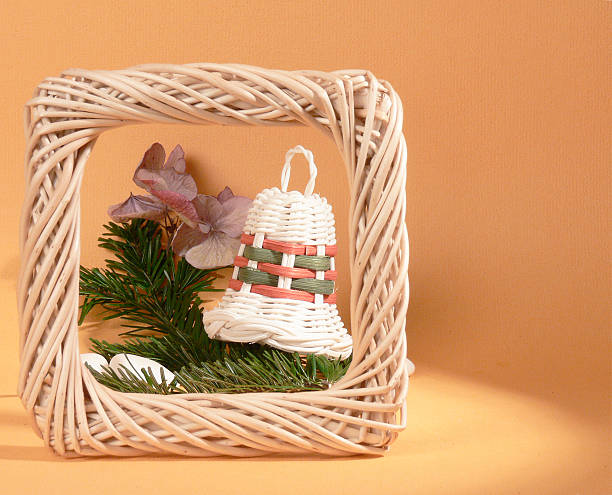 Still life with one wicker Christmas bell stock photo