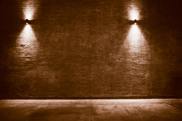 istock old room with brick wall, grungy background . brick wall with bulb lights lamp 1196624871