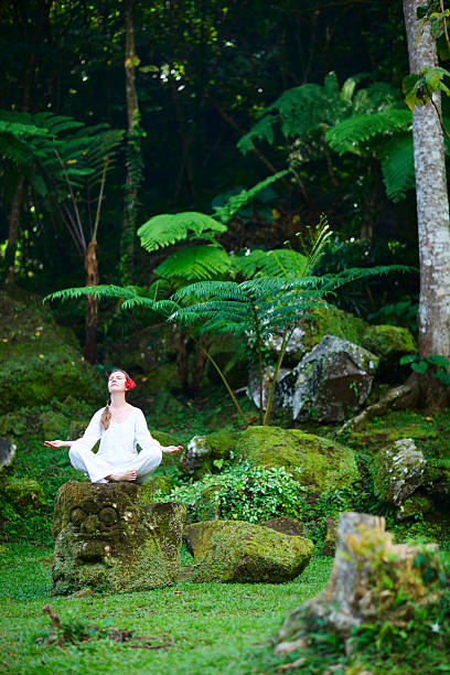 istock Woman meditating outdoors 119662520