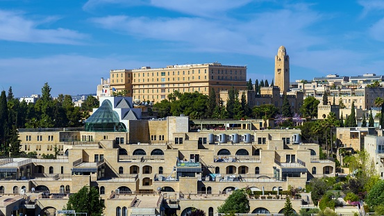 Jerusalem, Israel, May 5, 2019: On the horizon Hotel King David and Hotel Jerusalem International YMCA (tower).