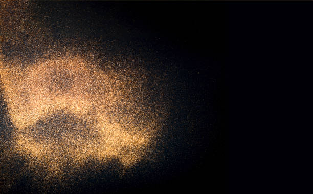 istock Black background with golden sparkles. Blurred  effect. Concept for festive background.Copy space 1196627548