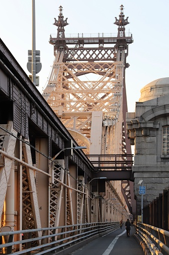 London, England, UK - August 14, 2023: People walking under Blackfriars Railway Bridge with the city of London