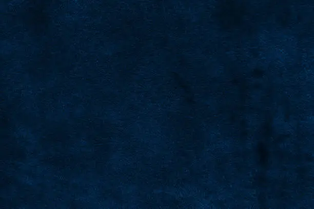 Photo of classic blue dark suede texture for background