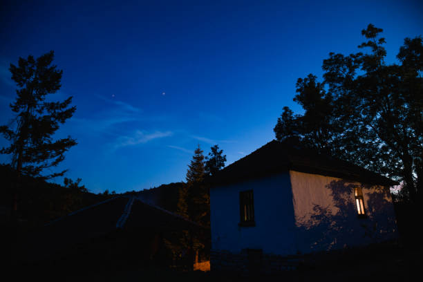 istock Milky way stars on a dark night sky. 1196636308
