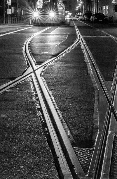 istock High Angle View Of Railroad Tracks At Night 1196641915