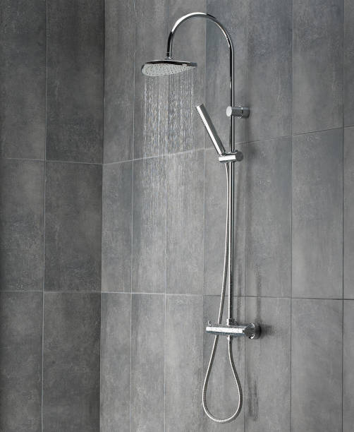 istock Running water from shower in bathroom 1196643926