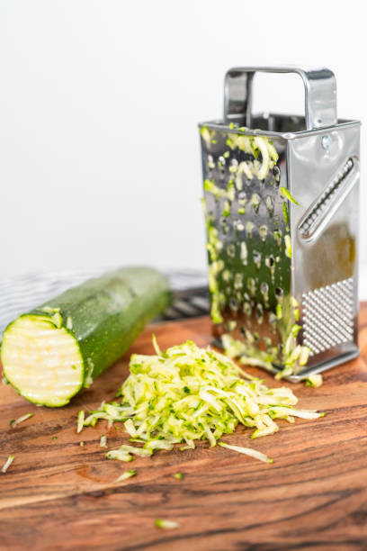 istock Grading organic zucchini to make zucchini cakes. 1196653521