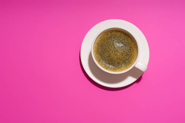 istock Flatlay with cofee cup on purple background 1196653731
