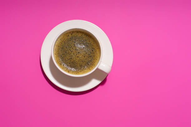 istock Flatlay with cofee cup on purple background 1196653737