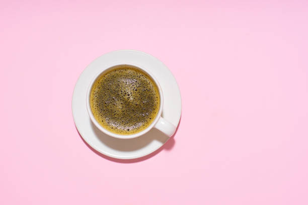 istock Flatlay with cofee cup on purple background 1196653782