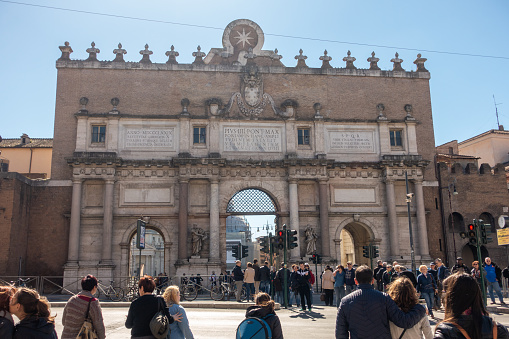 March 11, 2017 - Rome, Italy: tourists in front of Porta del Popolo city gate