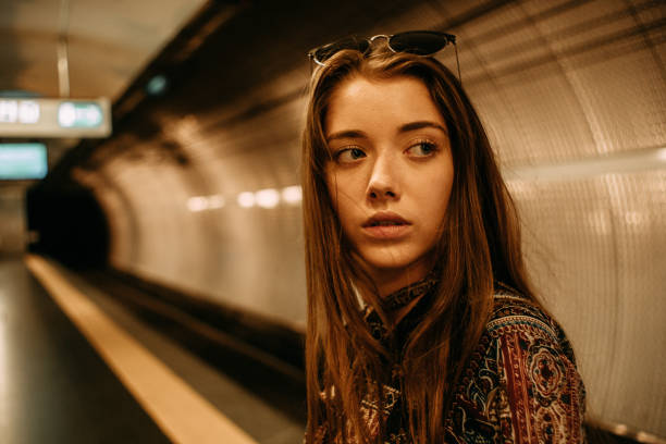 istock Girl at subway station 1196662405