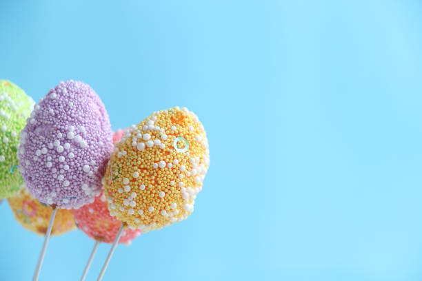 istock Group of colorful Easter eggs on sticks 1196662422