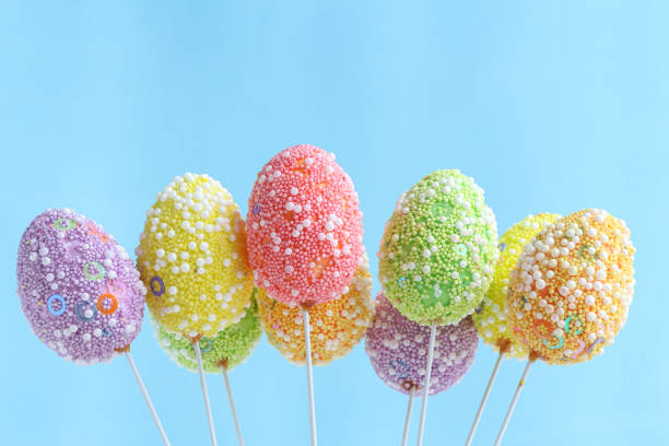istock Group of colorful Easter eggs on sticks 1196662442