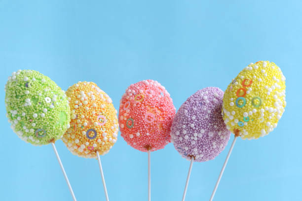 istock Group of colorful Easter eggs on sticks 1196662470