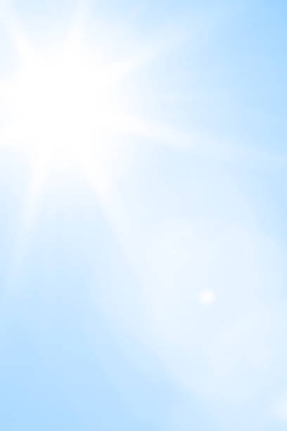 Bright sun with beautiful beams in the sky Bright sun with beautiful beams in the sky. Space for copy. light blue sky stock pictures, royalty-free photos & images