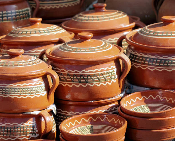 istock A group of clay pottery, hand made dishes 1196668387