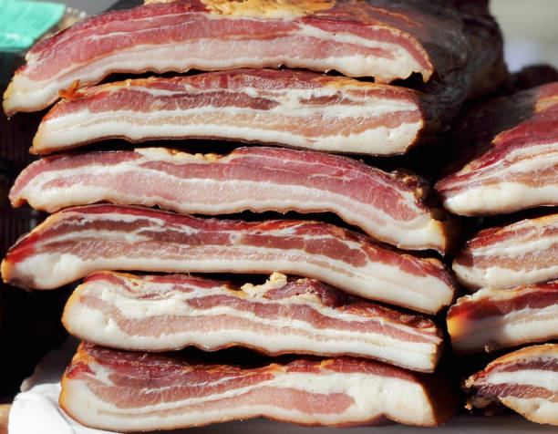 istock Homemade smoked bacon on the table 1196668457