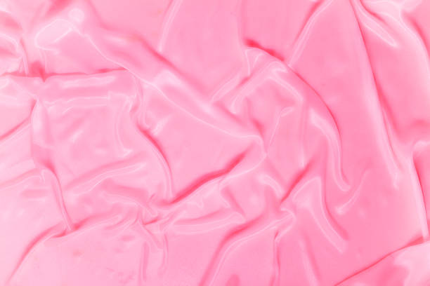 istock delicate waves of pink satin silk close up 119667507