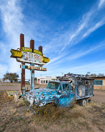Tucumcari, New Mexico, USA - November 10, 2019: Abandoned Ranch House Cafe sign and pick up truck on Route 66 in Tucumcari