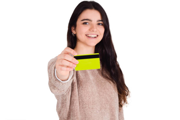istock Woman holding credit card. 1196680216