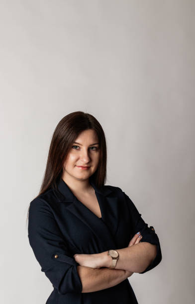 istock Young woman in blue. 1196680288