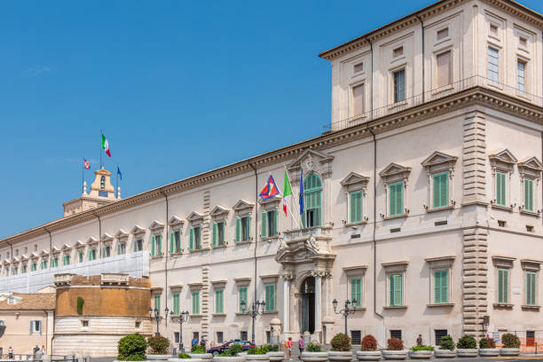 People walking outside the Quirinale building that holds the government authority in Rome, Italy. People walking outside the Quirinale building that holds the government authority in Rome, Italy. quirinal palace stock pictures, royalty-free photos & images