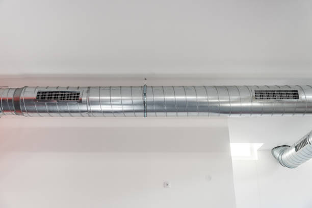 istock Vent system for indoor ventilation with metallic aluminum pipe and openings with grill for air extraction 1196682080