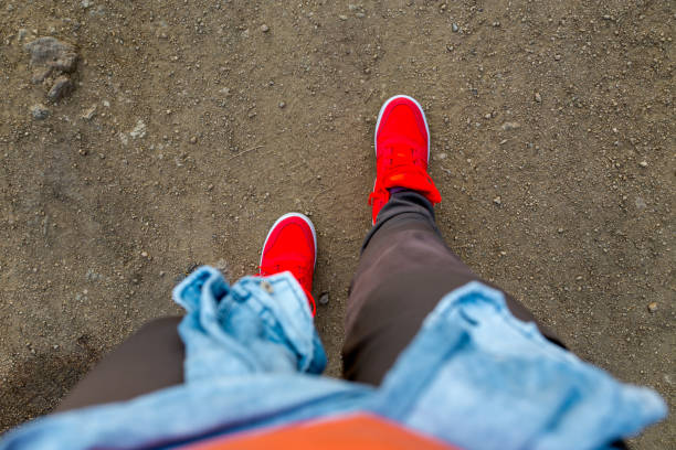 istock Foot and legs seen from above. Selfie great for any use. 1196687257