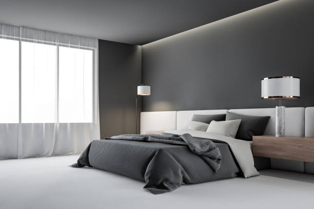 istock Gray master bedroom corner with lamp 1196690678