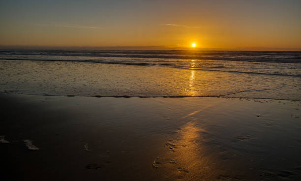 istock Beautiful sun setting into the Pacific on Mission Beach 1196691538